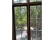 Outside window view showcasing mature trees and the neighborhood at 765 N Alexander St, Charlotte, NC 28202