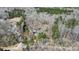 Birds-eye view of the property in a dense forest at 7921 Fairmont Dr, Waxhaw, NC 28173
