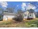 Exterior view of backyard showcasing spacious yard and charming home at 7921 Fairmont Dr, Waxhaw, NC 28173