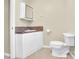 Bathroom featuring vanity with granite countertop and white toilet at 7921 Fairmont Dr, Waxhaw, NC 28173