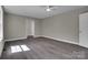 Bright bedroom featuring hardwood floors, neutral paint and great natural light at 7921 Fairmont Dr, Waxhaw, NC 28173