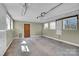 Spacious garage featuring pegboard, ample lighting, and a concrete floor at 7921 Fairmont Dr, Waxhaw, NC 28173