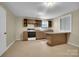 Kitchen boasting ample counter space and neutral color scheme at 7921 Fairmont Dr, Waxhaw, NC 28173
