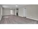 Open-concept living room showcasing durable floors and freshly painted walls at 7921 Fairmont Dr, Waxhaw, NC 28173