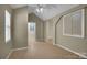 Comfortable room with neutral walls, fan, and tile floors at 7921 Fairmont Dr, Waxhaw, NC 28173