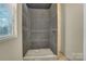 Under construction shower with new waterproofing membrane and drain in place at 7921 Fairmont Dr, Waxhaw, NC 28173