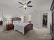 Bright main bedroom with ensuite bathroom access and walk-in closet at 8218 Deodora Cedar Ln, Charlotte, NC 28215