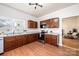 Bright kitchen featuring wood cabinets, stainless steel appliances and granite countertops at 909 1St S Ave, Conover, NC 28613