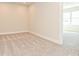 Spacious carpeted bedroom with an adjacent room at 95 Seven Oaks Lndg, Belmont, NC 28012