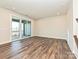 Living room with hardwood floors and sliding glass doors at 95 Seven Oaks Lndg, Belmont, NC 28012
