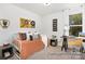Cozy bedroom with daybed, workspace, and bright windows at 11311 Magpie Ct # 2, Charlotte, NC 28215