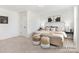 Bright secondary bedroom with plush bed and large windows at 11311 Magpie Ct # 2, Charlotte, NC 28215