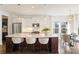 Kitchen with white cabinetry, stainless steel appliances, a large island, and access to the dining area at 1211 Pinecrest Ave, Charlotte, NC 28205