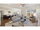 Spacious living area with open floor plan to the kitchen and lots of natural light at 1211 Pinecrest Ave, Charlotte, NC 28205