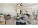 Open living room with a view of the kitchen, dining area, and stylish furniture at 1211 Pinecrest Ave, Charlotte, NC 28205