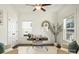 Bright home office featuring a modern desk, comfortable seating, and a decorative clock at 1211 Pinecrest Ave, Charlotte, NC 28205