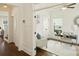 Stylish home office featuring a comfortable armchair, a desk, and ample natural light at 1211 Pinecrest Ave, Charlotte, NC 28205