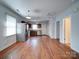 Open concept kitchen with stainless steel appliances and ample counter space at 1213 Cloninger Ave, Gastonia, NC 28052