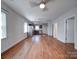 Open living area featuring modern lighting and access to the kitchen at 1213 Cloninger Ave, Gastonia, NC 28052