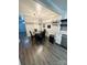 Dining room with stylish light fixture and room for four chairs open to the kitchen at 128 N Oak St, Salisbury, NC 28146