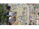 Aerial shot of the house and surroundings with a road nearby at 1354 Mirror Lake Rd, Lincolnton, NC 28092