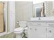 Bathroom with decorative wallpaper and traditional vanity at 1354 Mirror Lake Rd, Lincolnton, NC 28092