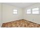 Bedroom featuring carpeted floors and dual windows at 1354 Mirror Lake Rd, Lincolnton, NC 28092