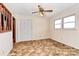 Bright bedroom with a window, ceiling fan, and closet space at 1354 Mirror Lake Rd, Lincolnton, NC 28092