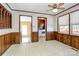 Dining area with wood trim, and a view of the laundry area and backyard at 1354 Mirror Lake Rd, Lincolnton, NC 28092
