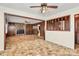 Spacious living room with fireplace, wood trim, and seamless flow to adjoining rooms at 1354 Mirror Lake Rd, Lincolnton, NC 28092