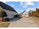 View of the garages and driveway of this home featuring plenty of parking spaces at 144 Cameron Dr, Salisbury, NC 28147