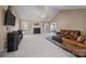 Spacious living room featuring a fireplace, vaulted ceilings, and carpeted floors at 144 Cameron Dr, Salisbury, NC 28147