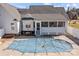 The covered pool and screened-in porch provide the perfect place to relax in privacy at 144 Cameron Dr, Salisbury, NC 28147