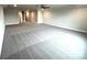 Vast bonus room with neutral carpet, ceiling fan, recessed lighting, and ample space for various activities at 160 Swann Rd # 6, Statesville, NC 28625