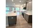 Stylish kitchen with white subway tile backsplash, stainless steel appliances, and eat-in island at 160 Swann Rd # 6, Statesville, NC 28625