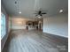 Expansive living room featuring hardwood floors, recessed lighting and an open floor plan concept at 160 Swann Rd # 6, Statesville, NC 28625