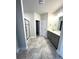 Main bathroom with double vanity, walk-in shower with glass door and ceramic tile floor at 160 Swann Rd # 6, Statesville, NC 28625