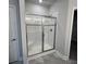 Shower showcasing sleek subway tile, glass door, and a built-in bench for relaxing at 160 Swann Rd # 6, Statesville, NC 28625