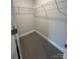 A walk-in closet featuring wire shelving and neutral carpeting, offering ample storage space at 160 Swann Rd # 6, Statesville, NC 28625