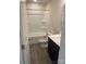 Clean bathroom with tub, toilet and dark vanity at 1606 Lincoln Dr, Shelby, NC 28152