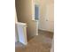 Upstairs hallway with carpet and a staircase at 1606 Lincoln Dr, Shelby, NC 28152