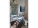 Bathroom with single sink vanity, toilet, and shower/tub at 184 Flat Rock Dr, Denver, NC 28037