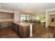Spacious kitchen with granite island that flows into the living and dining areas at 184 Flat Rock Dr, Denver, NC 28037