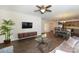Open-concept living area adjacent to kitchen with wood floors and modern decor at 184 Flat Rock Dr, Denver, NC 28037