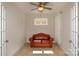 Office area with a comfortable leather love seat at 184 Flat Rock Dr, Denver, NC 28037