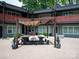 Inviting courtyard with picnic tables under a pergola, offering outdoor seating at 2000 Patio Ct # 101, Charlotte, NC 28205