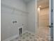 Laundry room with built-in shelving and closet at 207 Halemarge Drive Dr, Belmont, NC 28012