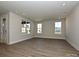 Spacious living room with hardwood floors and large windows at 207 Halemarge Drive Dr, Belmont, NC 28012