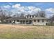 Large patio extends from the home and provides space for relaxing and entertaining at 2100 Sunderland Pl, Charlotte, NC 28211