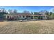 Expansive backyard featuring a patio, fenced yard, and well-maintained lawn with mature landscaping at 2100 Sunderland Pl, Charlotte, NC 28211